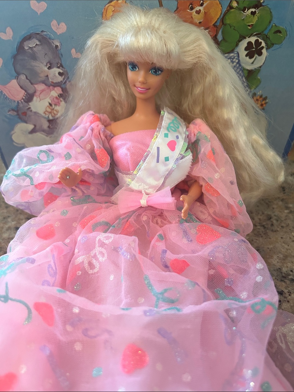 Vintage 90s Barbie, wearing a birthday dress, as is
